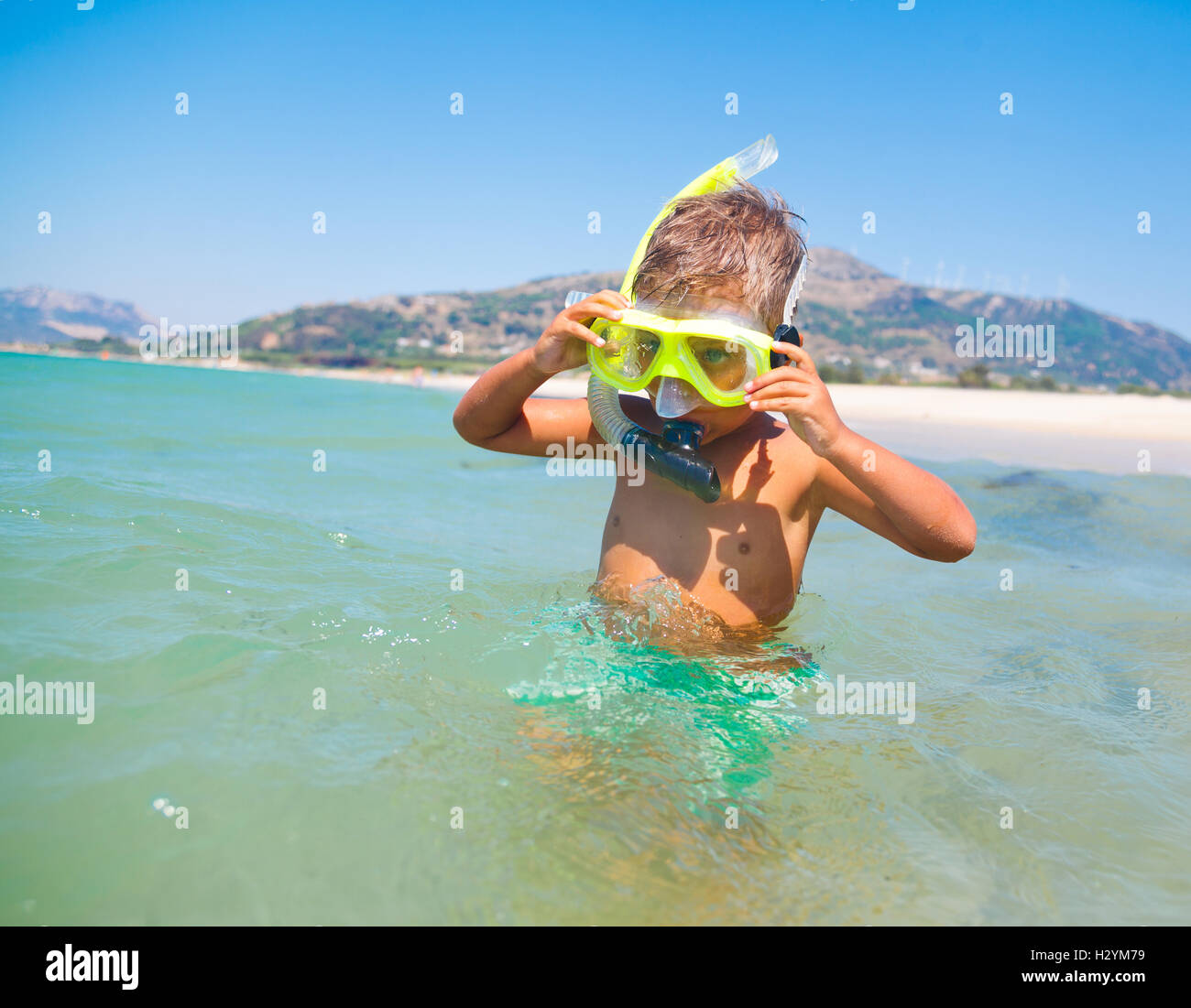 Happy boy in face masks Stock Photo
