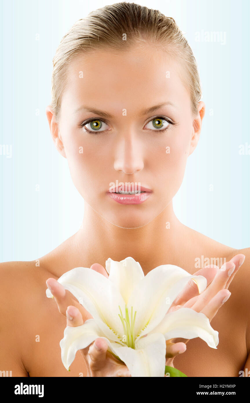 eyes and white lily Stock Photo Alamy