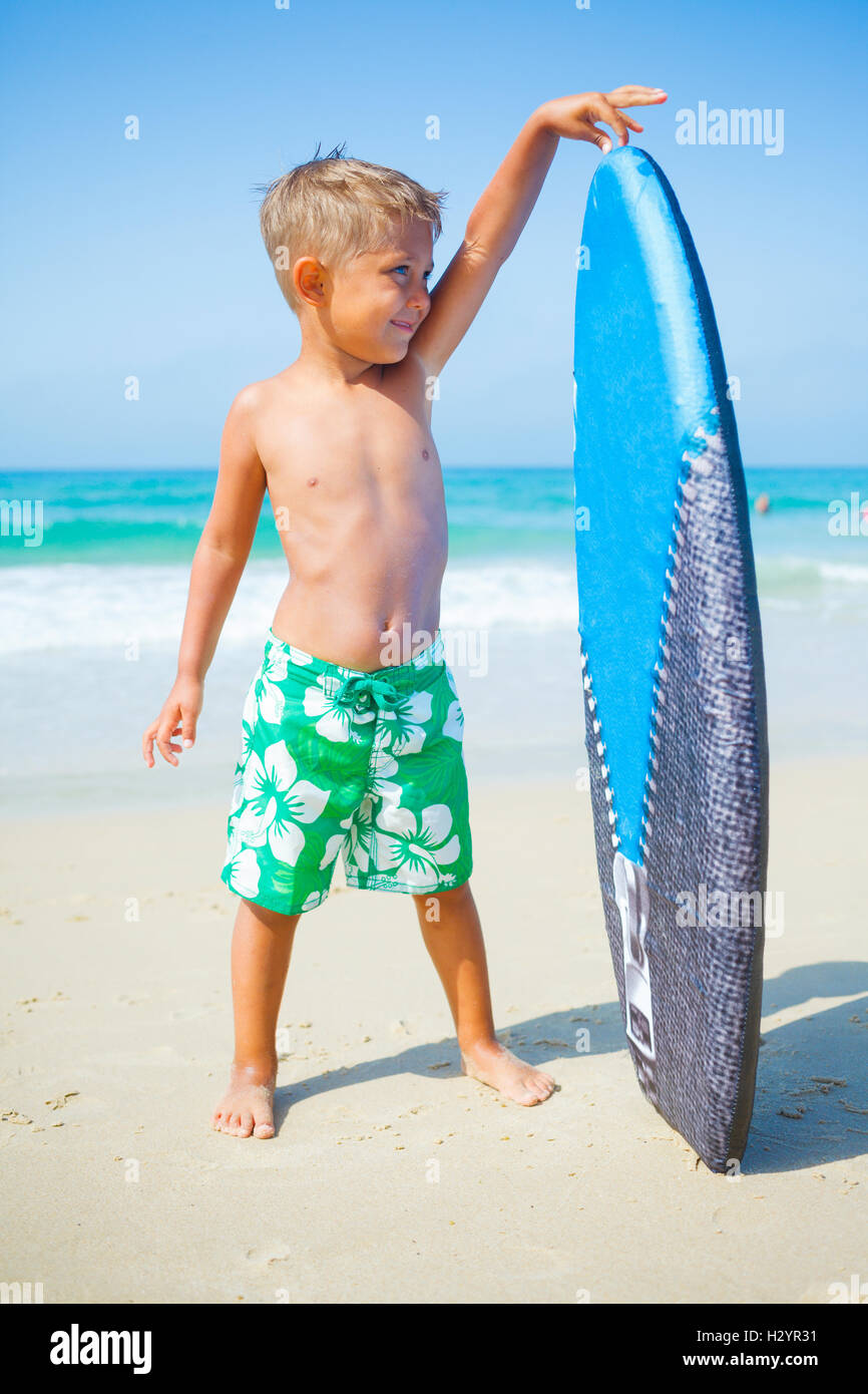 boy has fun with the surfboard Stock Photo