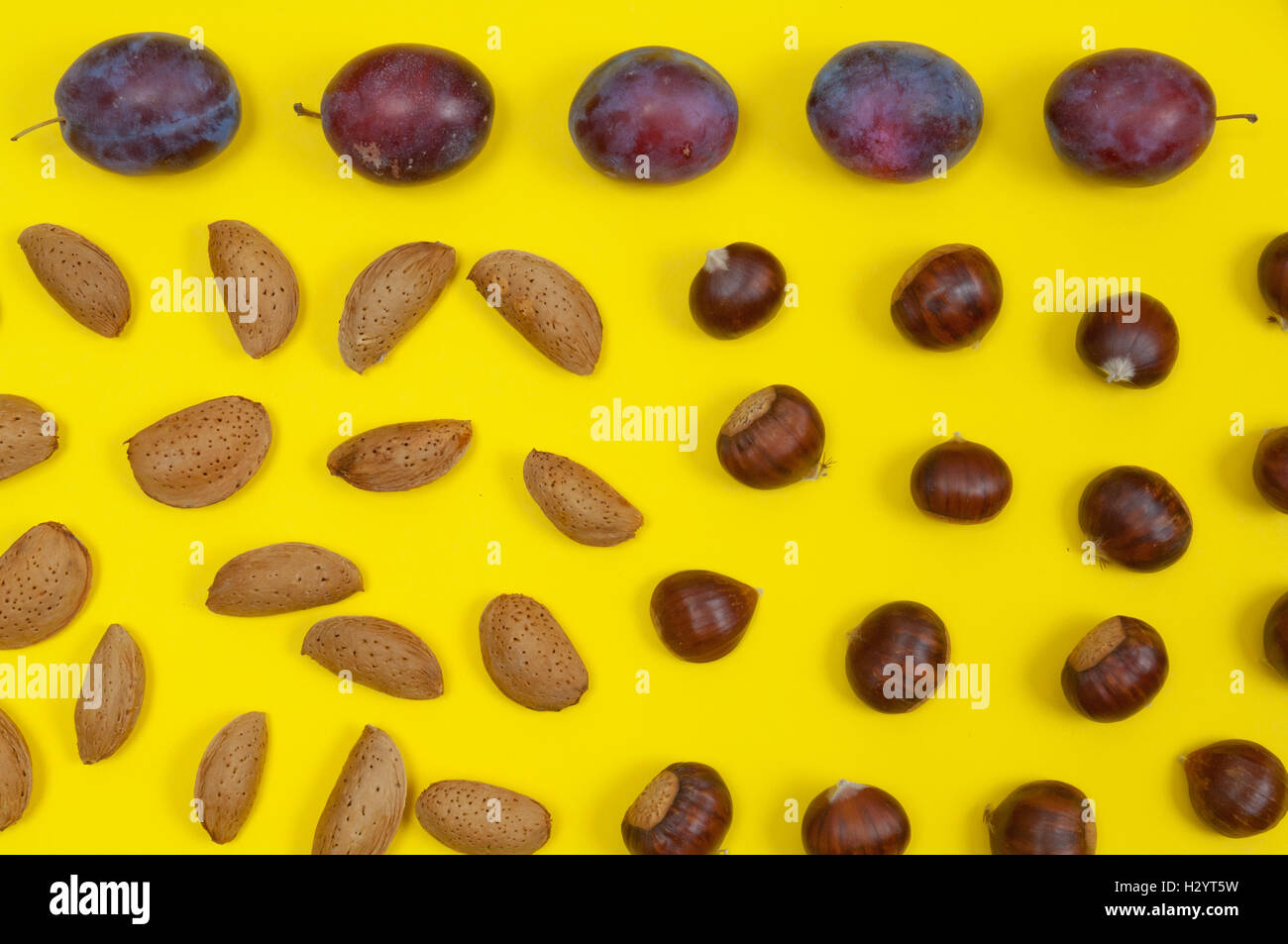 Fruits on yellow background Stock Photo