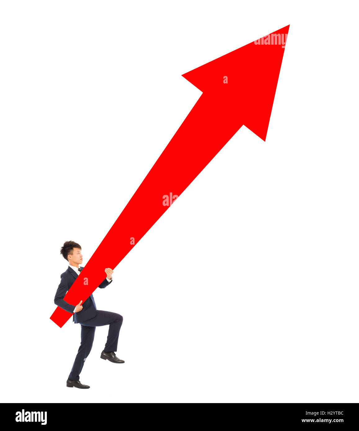 businessman walking and holding a upward red arrow Stock Photo - Alamy