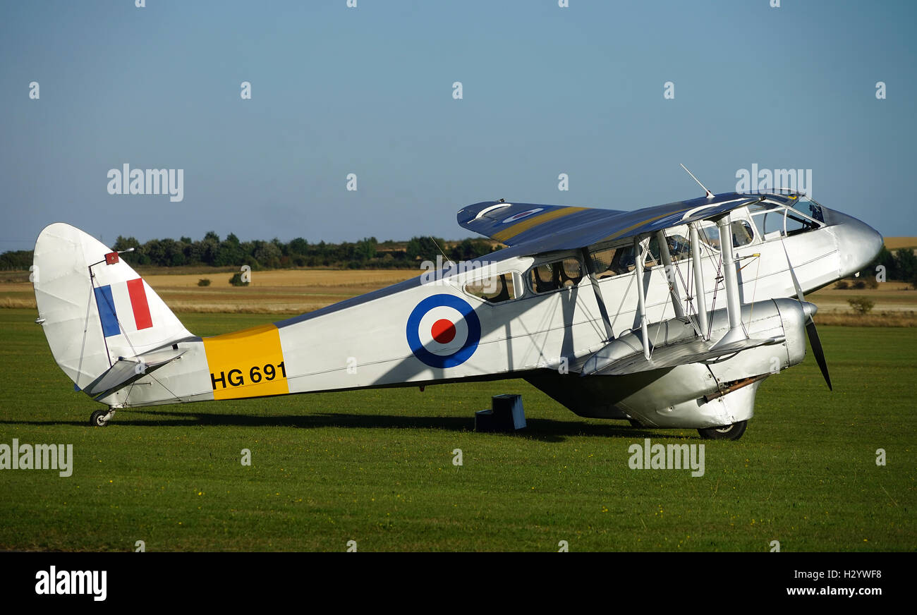 De Havilland DH89 Dominie sits on the airfield at Duxford, Cambridgeshire, England. Stock Photo
