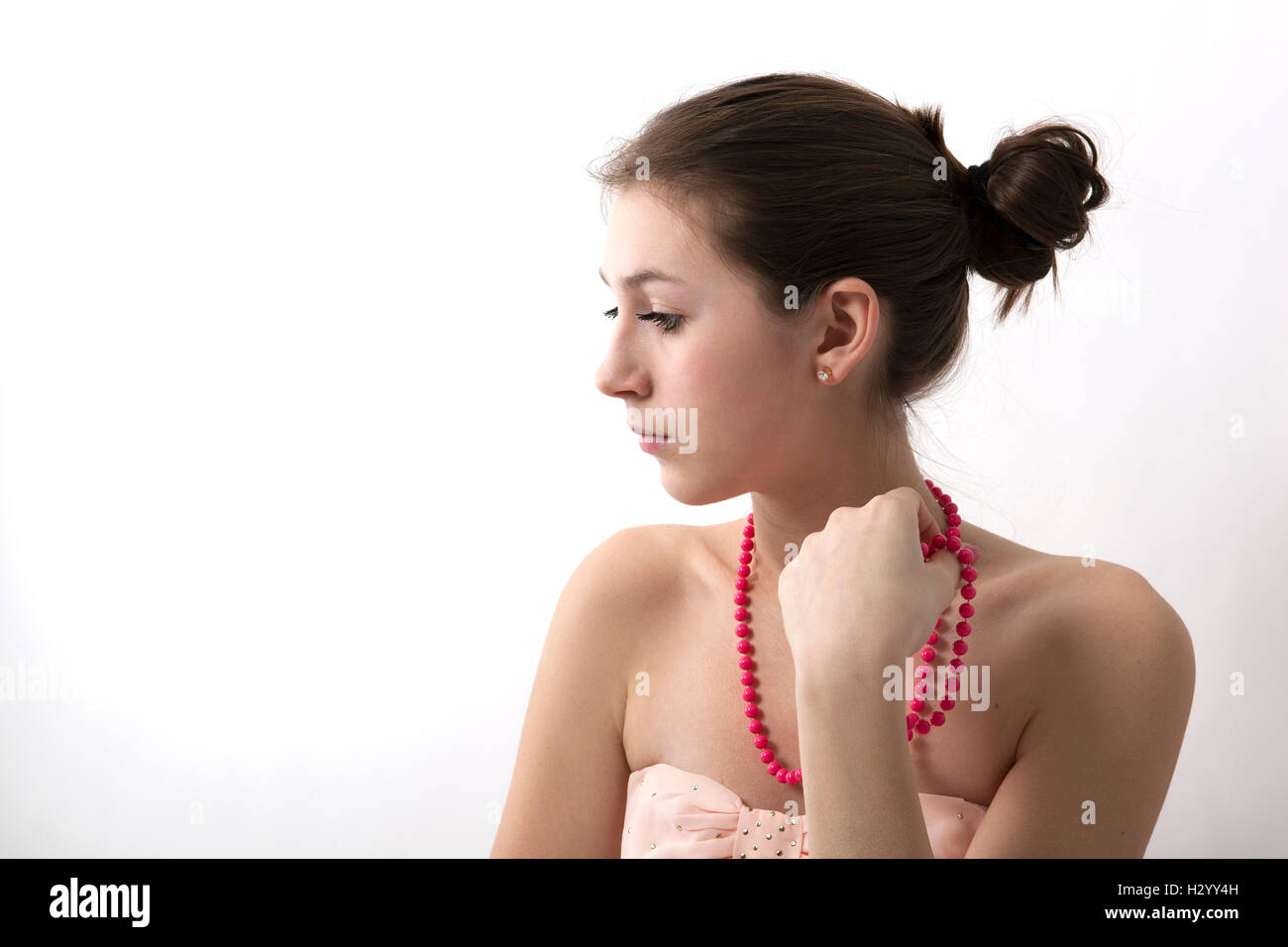 portrait of a girl with pink beads Stock Photo