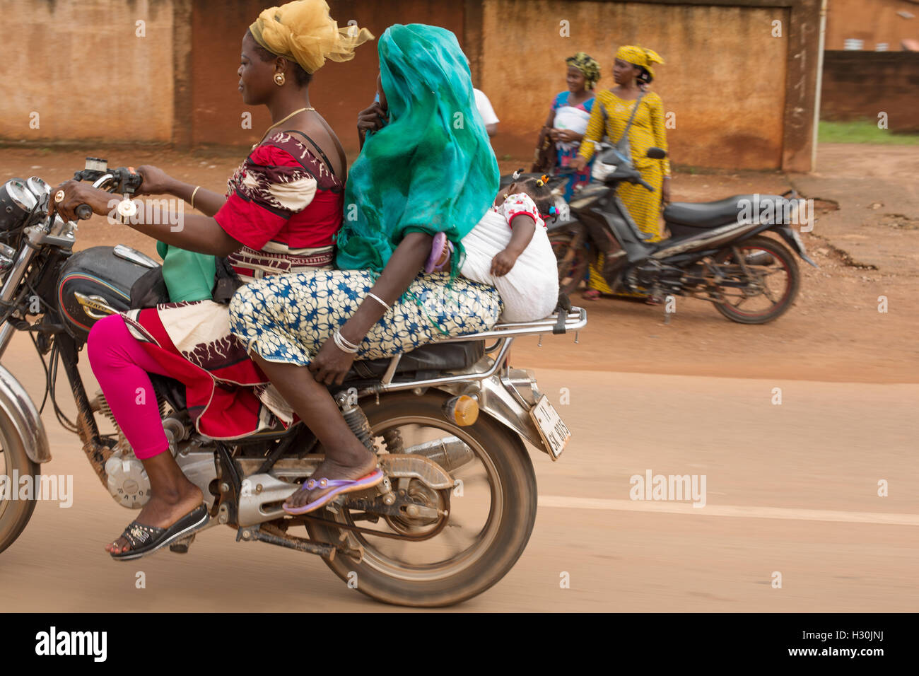 The motor bike is a popular form of transportation in Burkina Faso, West  Africa Stock Photo - Alamy
