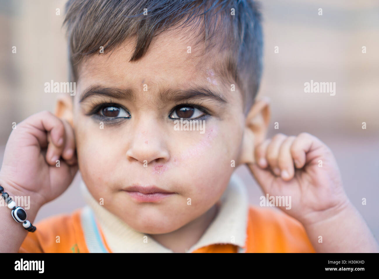 Portrait of a 2 years old baby boy outdoors Multan, Pakistan Asia Stock Photo