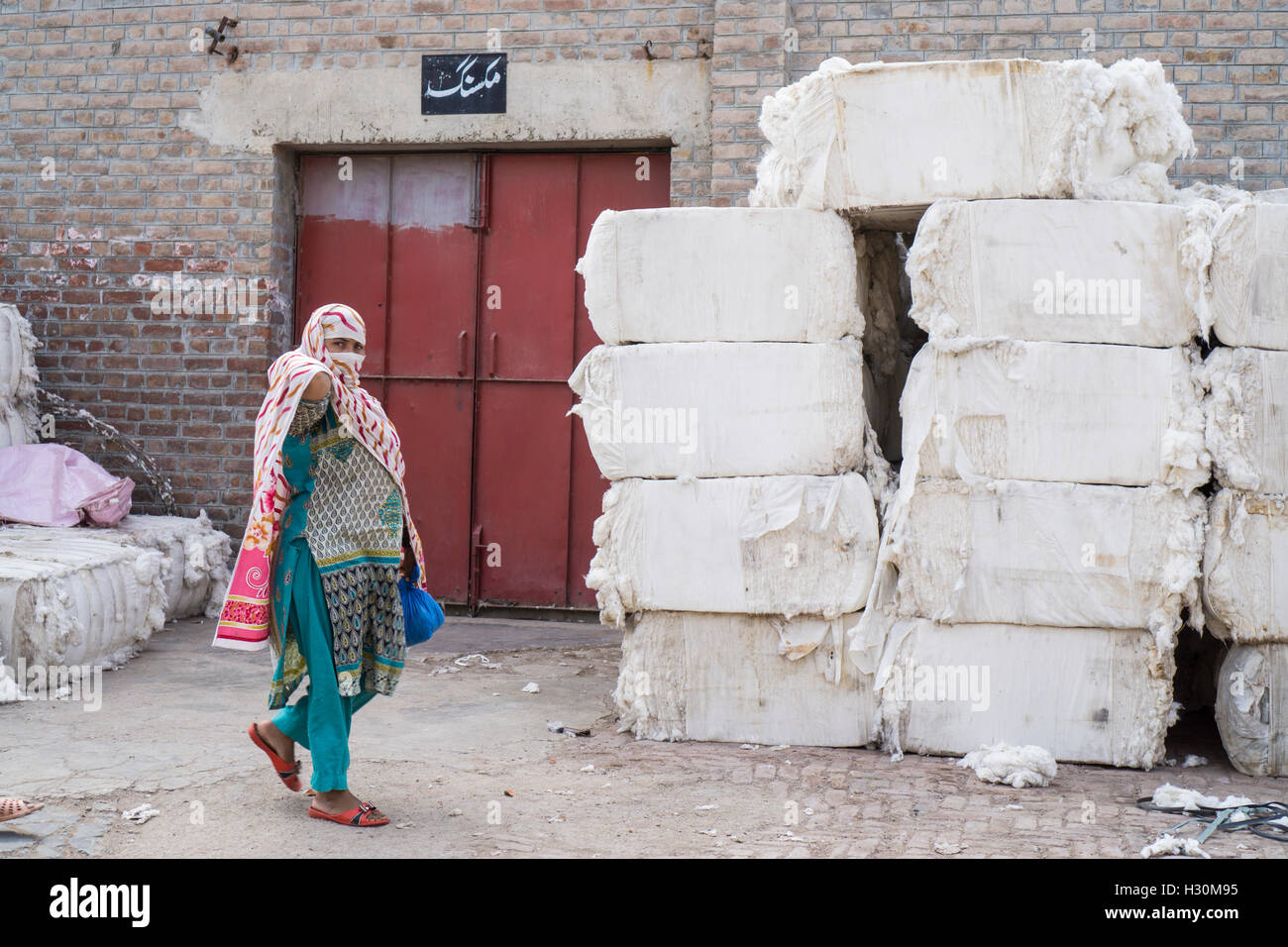 Pakistani female working outside cotton mill Multan Pakistan Stock
