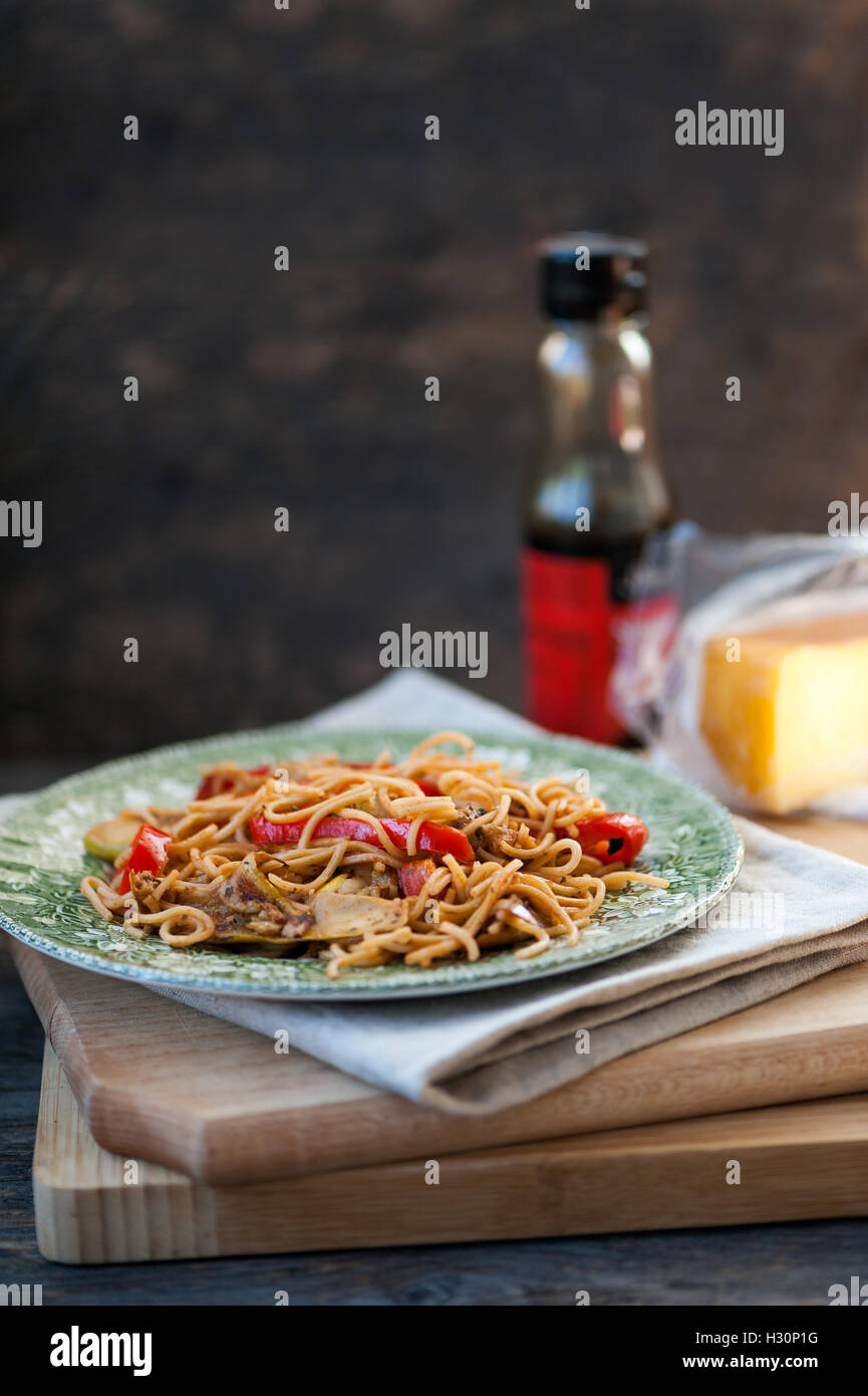Noodles with eggplant, zucchini and red pepper Stock Photo Alamy