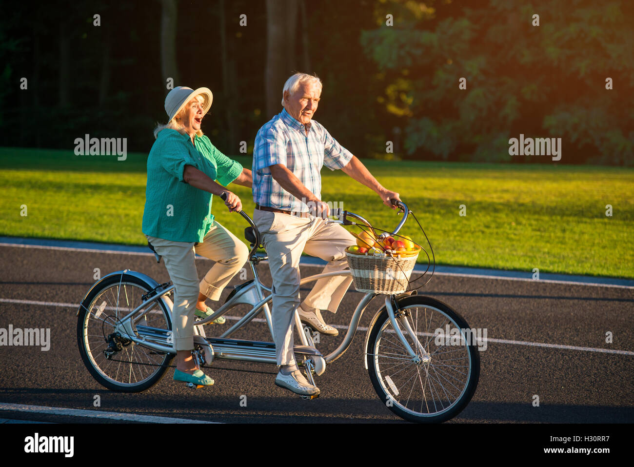 Senior couple on tandem bike Stock Photo Alamy