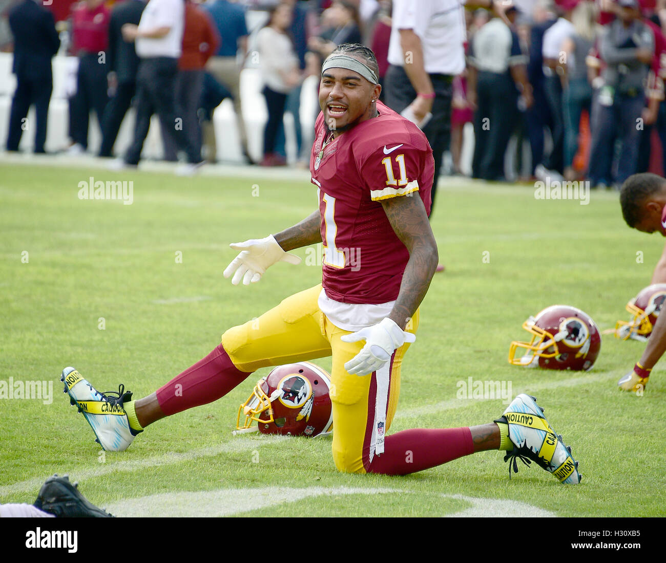 Washington Redskins wide receiver DeSean Jackson (11) warms-up prior to the game against the Cleveland Browns at FedEx Field in Landover, Maryland on October 2, 2016.  Earlier in the day, the Redskins released the a statement about Jackson's shoes.  Jackson is quoted as saying “Today is the start of my attempts to be part of a solution and start dialogue about the senseless killings of both citizens and police. I have chosen to wear these cleats in pregame today to use my platform as a pro athlete to add to this discussion. This isn’t meant to be any kind of protest against the good men and wo Stock Photo