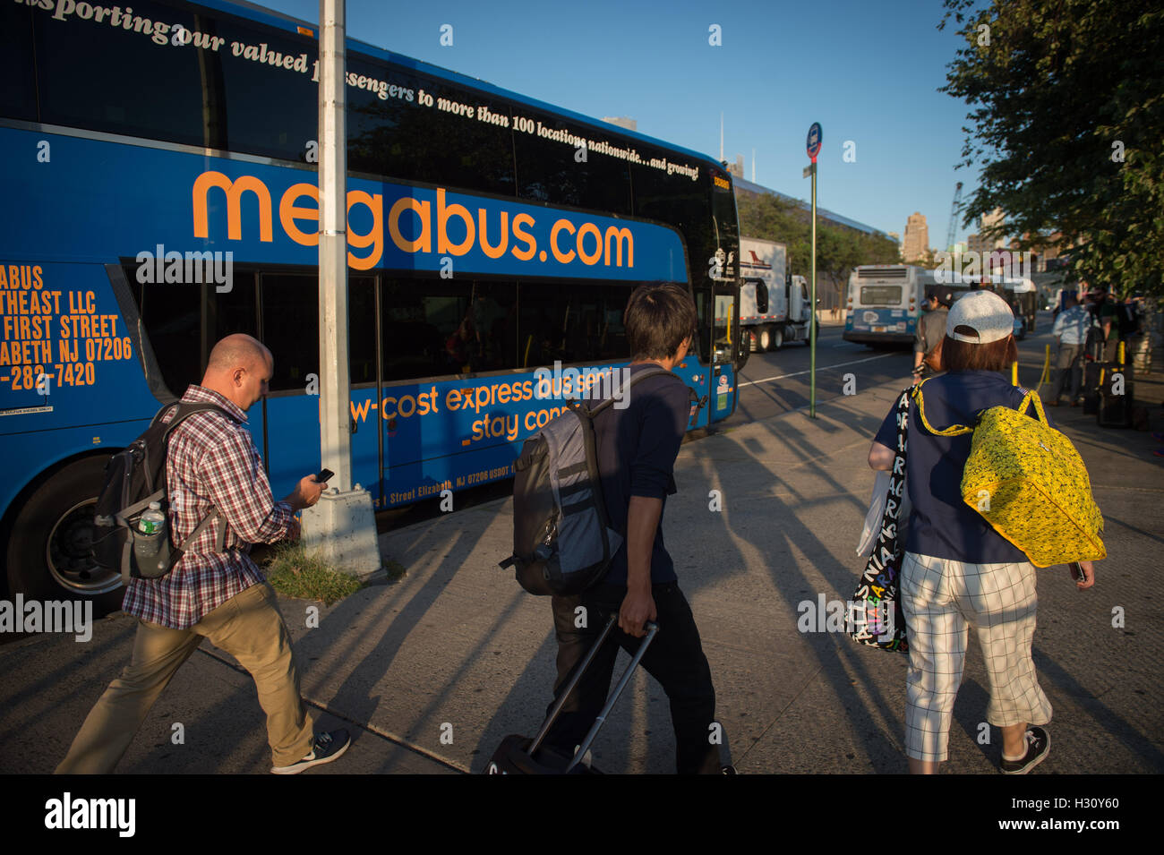 New York, NY, USA. 13th Sep, 2016. Passengers board a Megabus on 34th