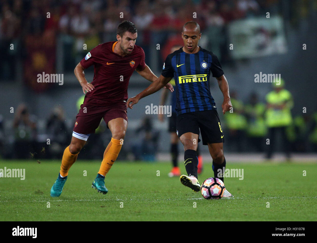Stadium Olimpico, Rome, Italy. 02nd Oct, 2016. Strootman and Jose Mario challenge for the ball during the Serie A match between Roma versus Inter in Olimpic stadium in Rome on October 2016. Credit:  Action Plus Sports/Alamy Live News Stock Photo