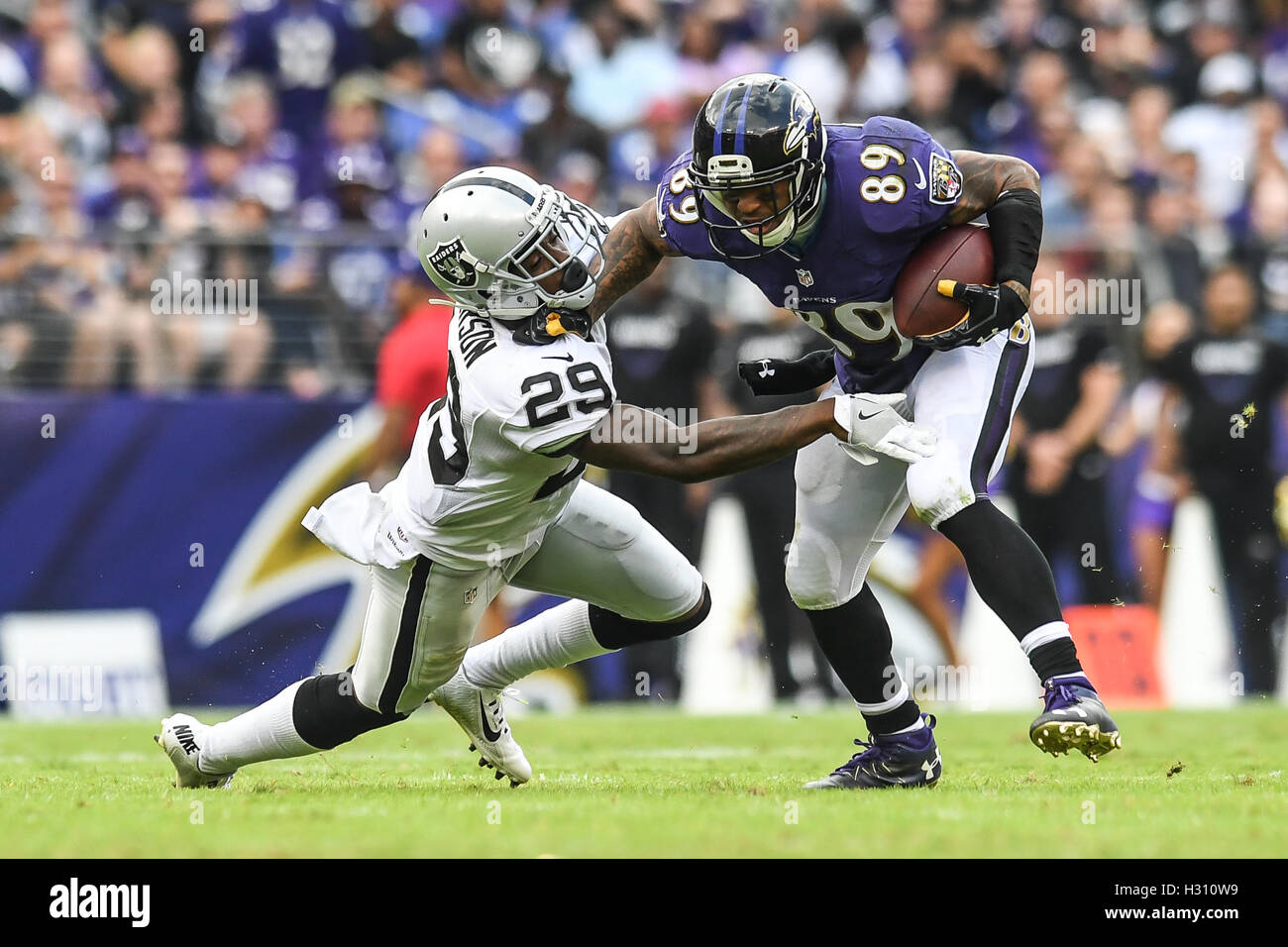 Baltimore, Maryland, USA. 2nd Oct, 2016. Baltimore Ravens wide receiver STEVEN SMITH SR. (89) avoids being tackled by Oakland Raider player DAVID AMERSON (29) at M & T Bank Stadium in Baltimore, Maryland. Credit:  Amy Sanderson/ZUMA Wire/Alamy Live News Stock Photo