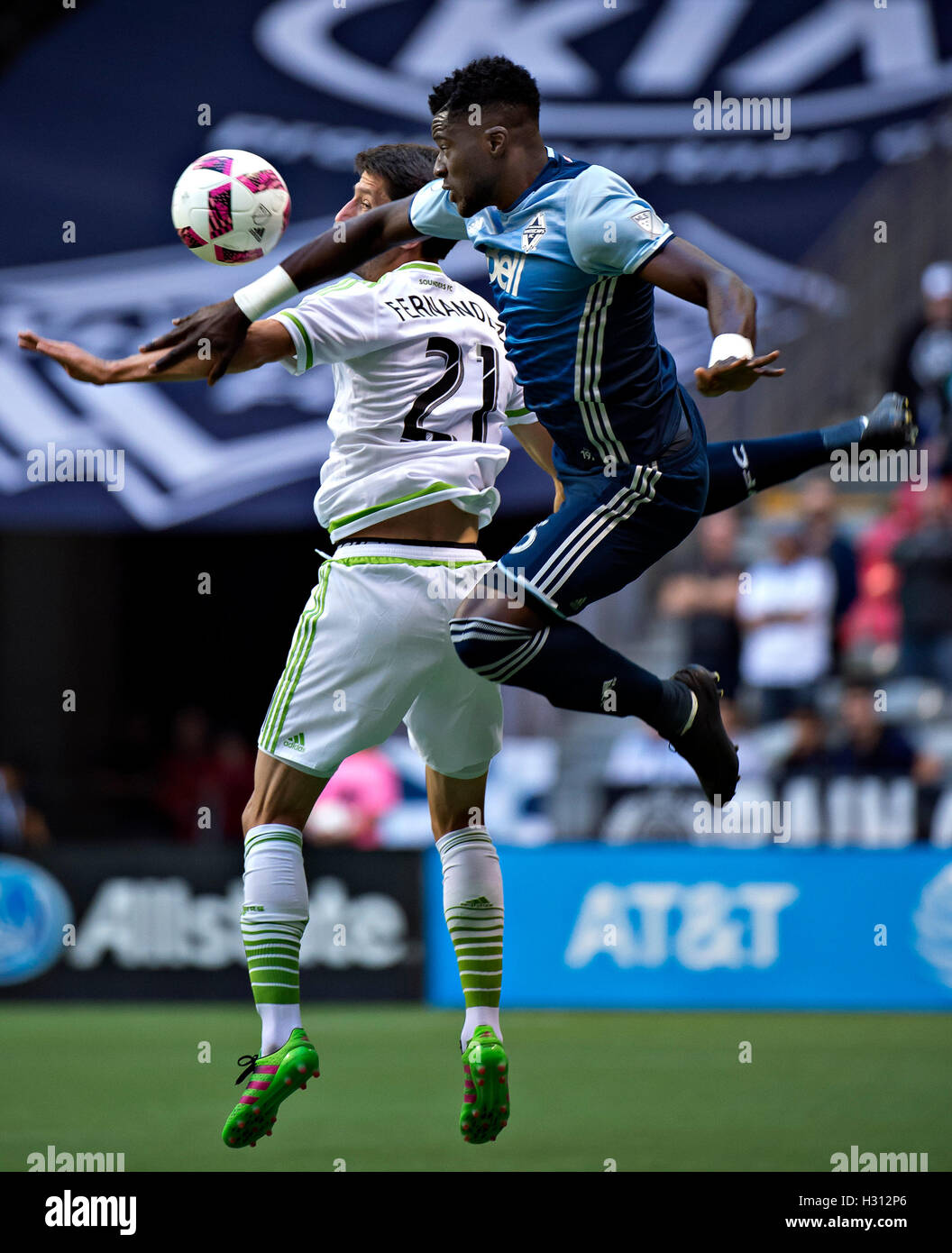 Vancouver, Canada. 2nd Oct, 2016. Seattle Sounders FC's Alvaro Fernandez (L) vies with Vancouver Whitecaps' Jordan Smith during the Major League Soccer (MLS) in Vancouver, Canada, on Oct. 2, 2016. Vancouver Whitecaps lost 1-2. Credit:  Andrew Soong/Xinhua/Alamy Live News Stock Photo