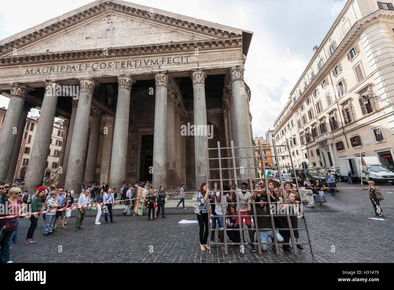 Rome, Italy. 03rd October, 2016. Members of ARCI association hold a 'flashmob' in Pantheon Square to remember the victims of immigration in Rome, Italy on October 03, 2016. The Italian Republic recognises 3 October as National Day in memory of the victims of immigration, commemorating those “who lost their lives trying to emigrate towards our country to escape wars, persecution and poverty”. The day is chosen to pay respect to the 366 migrants who drowned on October 3 2012 in the Mediterranean in view of the Sicilian Island of Lampedusa. Credit:  Giuseppe Ciccia/Alamy Live News Stock Photo