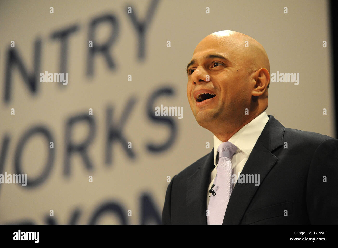 Birmingham, UK. 3rd October, 2016.  Sajid Javid, Secretary of State for Community and Local Government, delivers his speech to conference, on the second day of the Conservative Party Conference at the ICC Birmingham. The theme of the speech was 'An Economy that Works for Everyone'. This conference follows the referendum decision for the UK to leave the European Union, and the subsequent election of Theresa May as  leader of the Conservative Party. Kevin Hayes/Alamy Live News Stock Photo