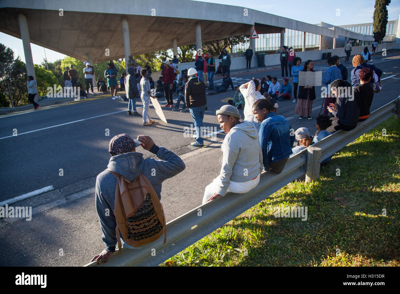 On October 3 three entrances to the University of Cape Town UCT South Africa were blocked by students protesting for free education. At the upper north entrance group of 20 sat in