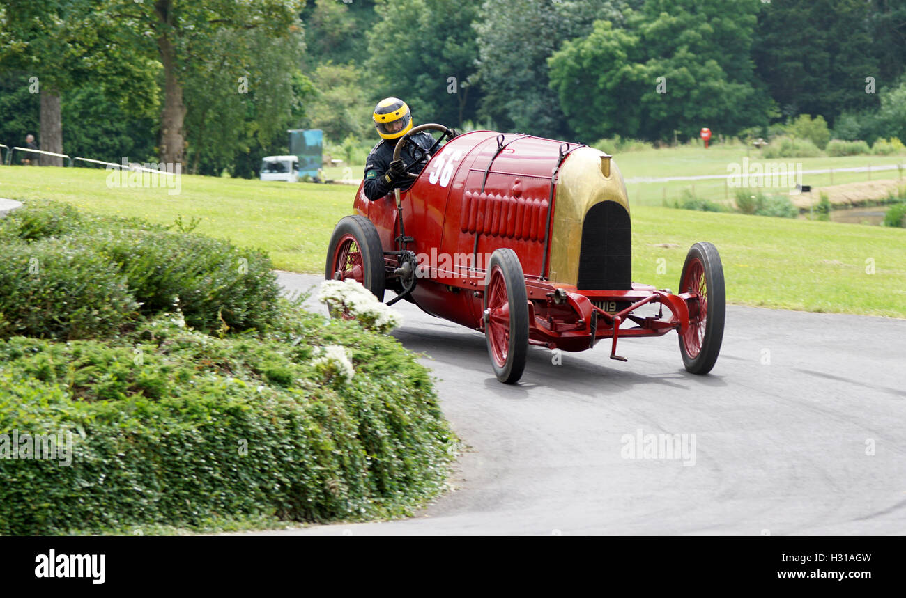 Duncan Pittaway wrestles the 1911 FIAT S76 known as The Beast of Turin through the roundabout at the 2016 Chateau Impney Stock Photo