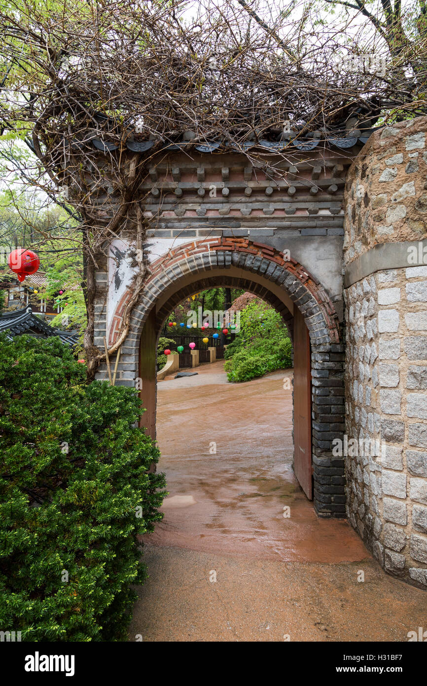 Gate and stone wall at the Gilsangsa Temple in Seoul, South Korea viewed from the front Stock
