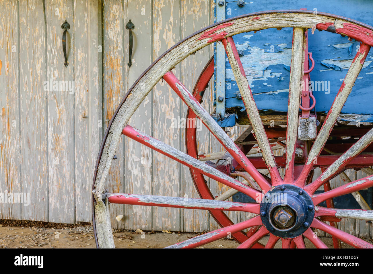 Red and Blue wagon with barn doors at Famington Plantation in Louisville, Jefferson County, Kentucky. Stock Photo
