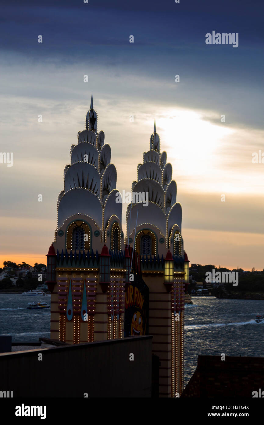 Luna Park two towers of entrance at sunset with view over Harbour Milsons Point North Shore Sydney New South Wales NSW Australia Stock Photo