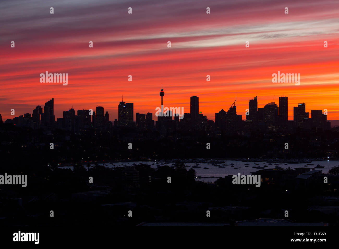Silhouette of Sydney CBD Central Business District skyline at sunset Sydney NSW Australia Stock Photo