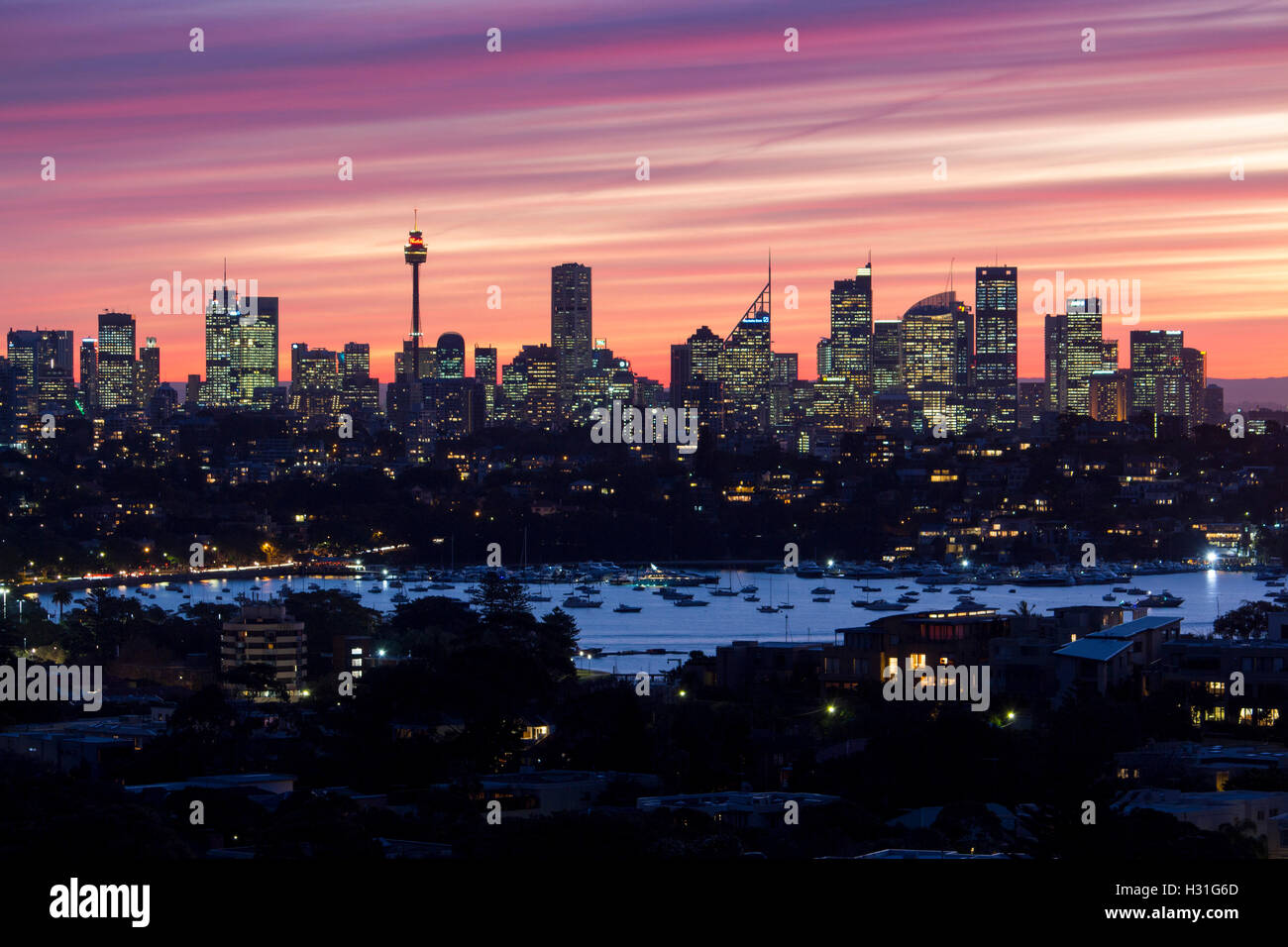 Sydney city CBD skyline at sunset night dusk Sydney NSW Australia Stock Photo