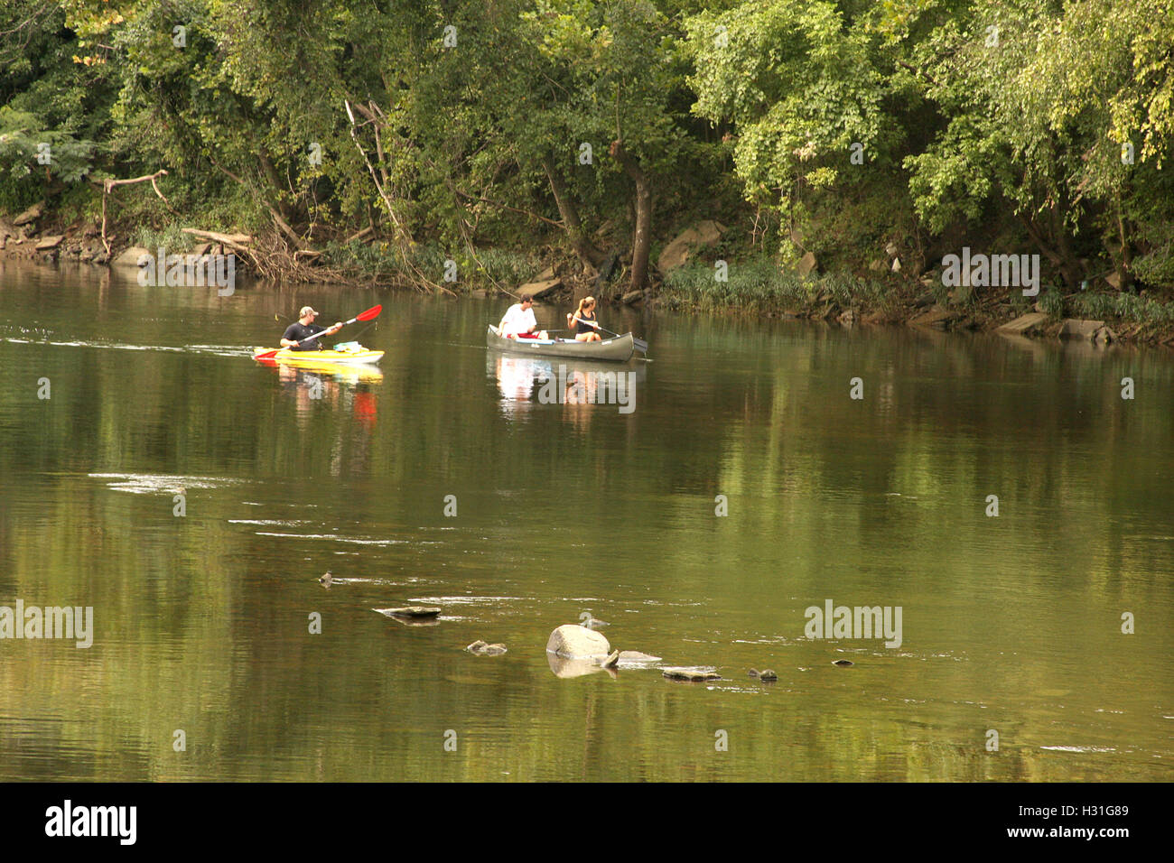 Various types of boats floating on James River at the kickof event for