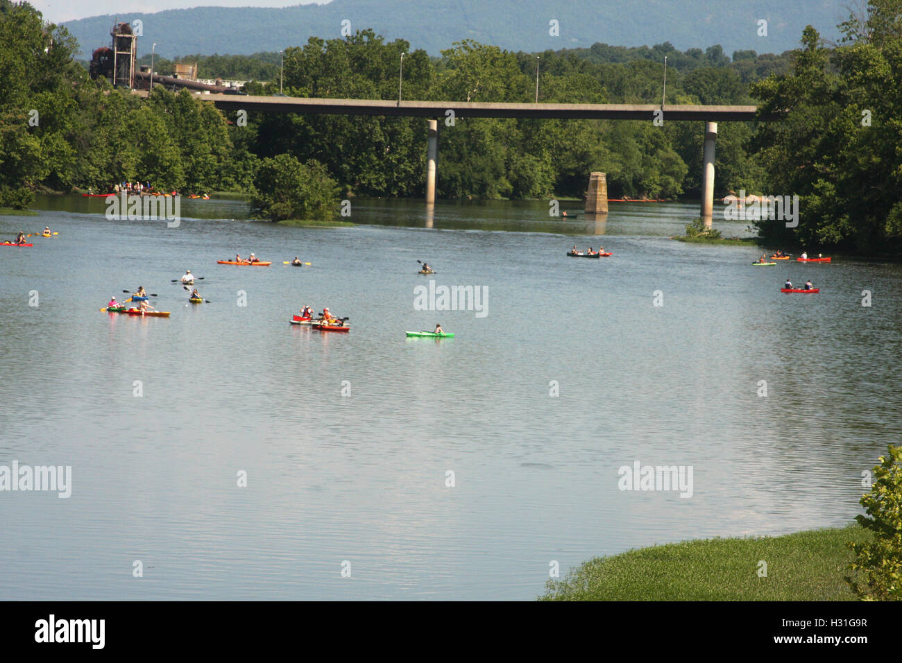 Various types of boats floating on James River at the kickof event for