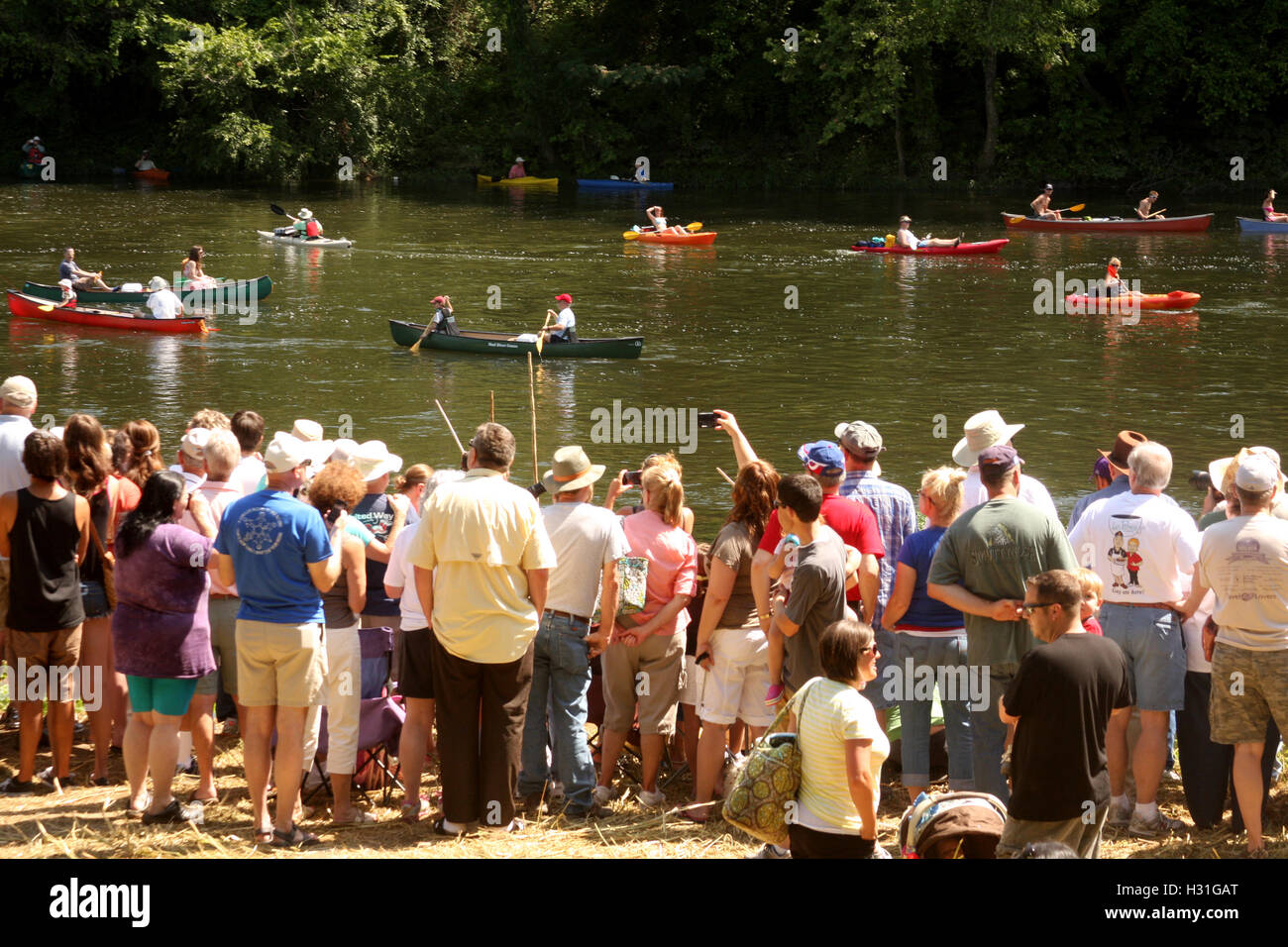 Various types of boats floating on James River at the kickof event for