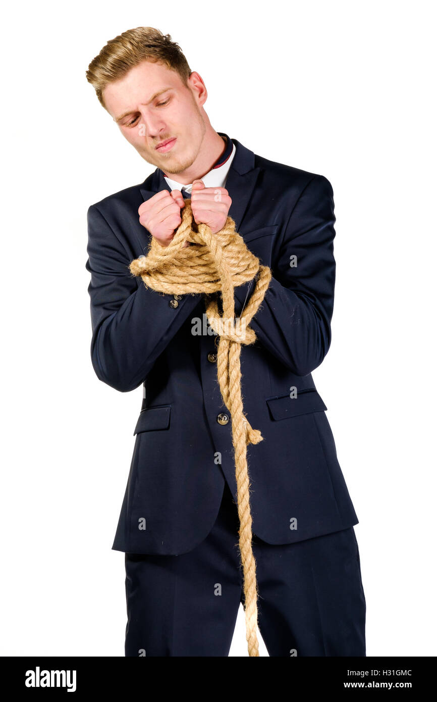 Young businessman in a suit tied up Stock Photo