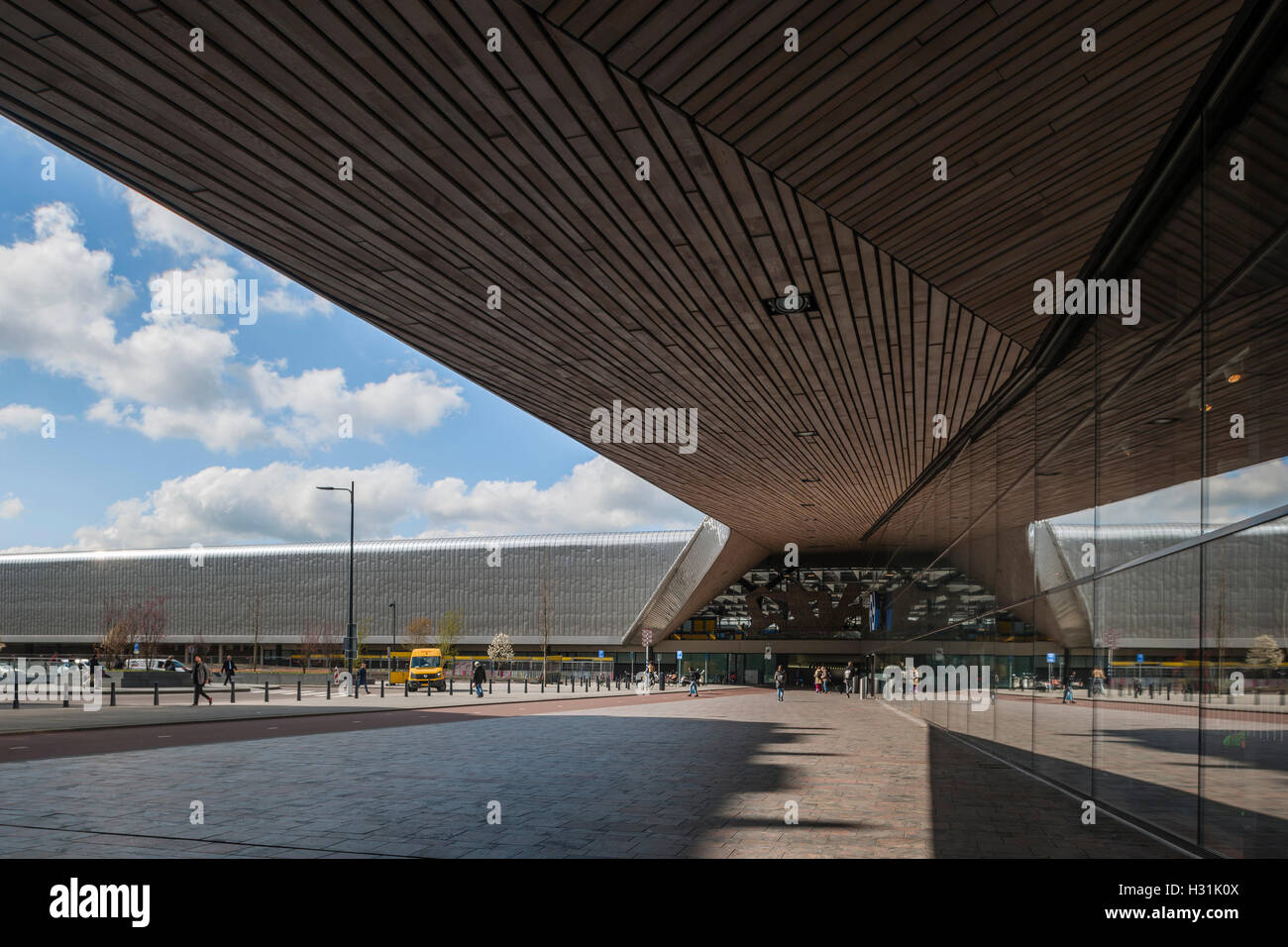 Lateral entrance to station showing wooden ceiling. Centraal Station, Rotterdam, Netherlands. Architect: Benthem Crouwel Architects + MVSA Architects + Wes, 2014. Stock Photo