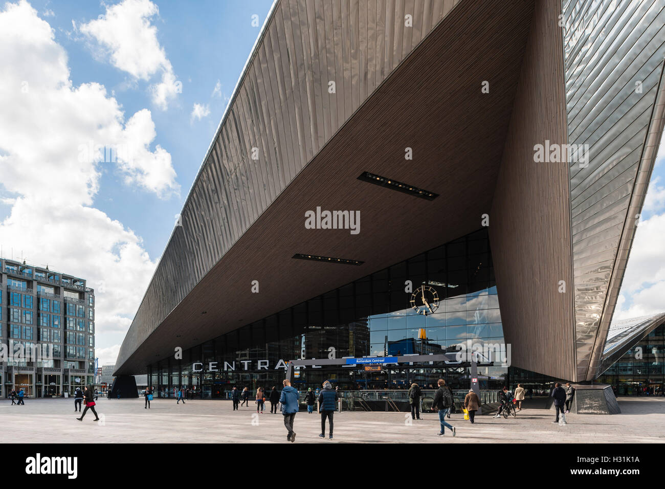 Elevation view of angular canopy showing metal cladding and wodden ceiling. Centraal Station, Rotterdam, Netherlands. Architect: Benthem Crouwel Architects + MVSA Architects + Wes, 2014. Stock Photo