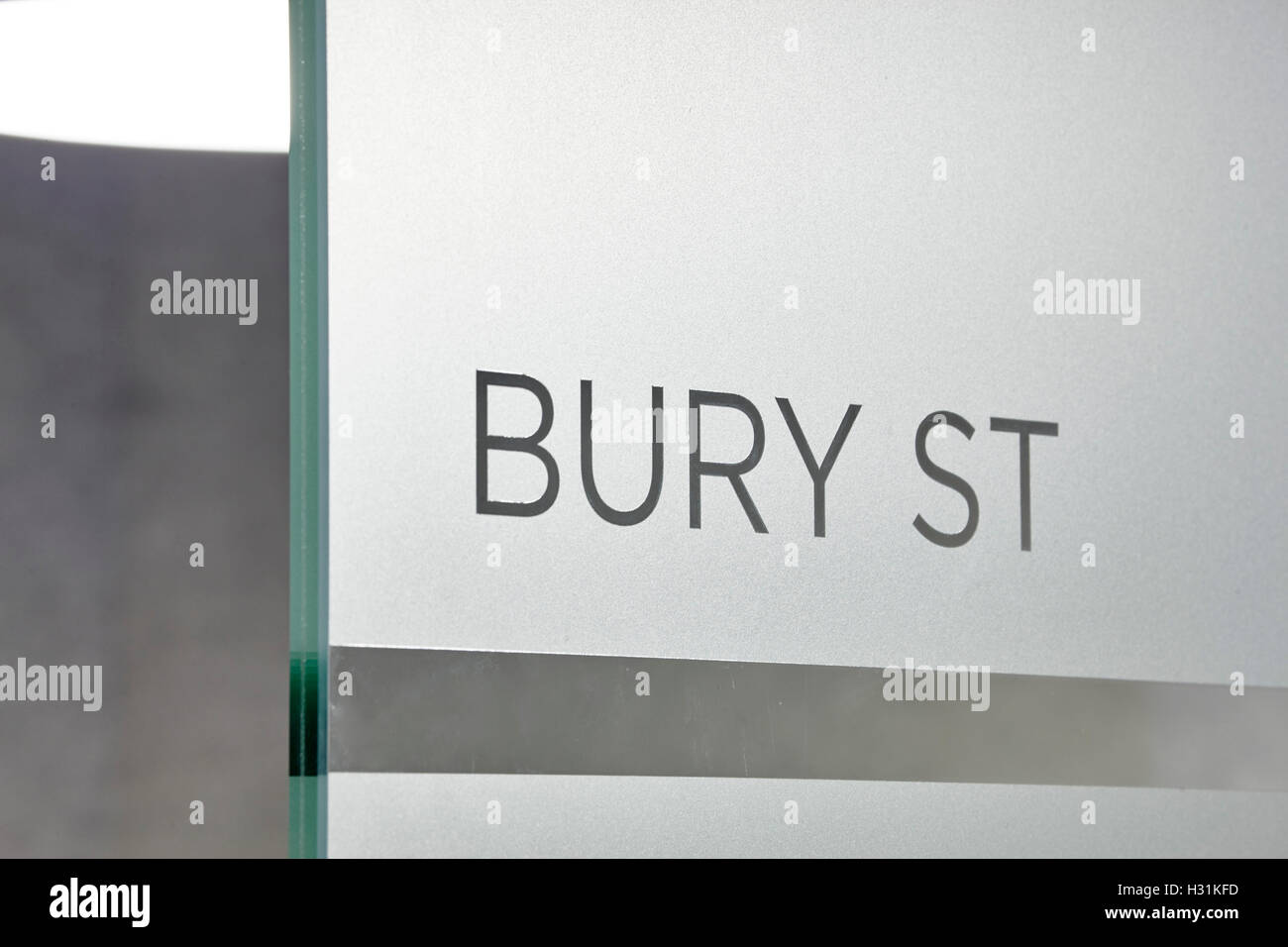 Detail of frosted glass signage. Office Space at The Gherkin, London