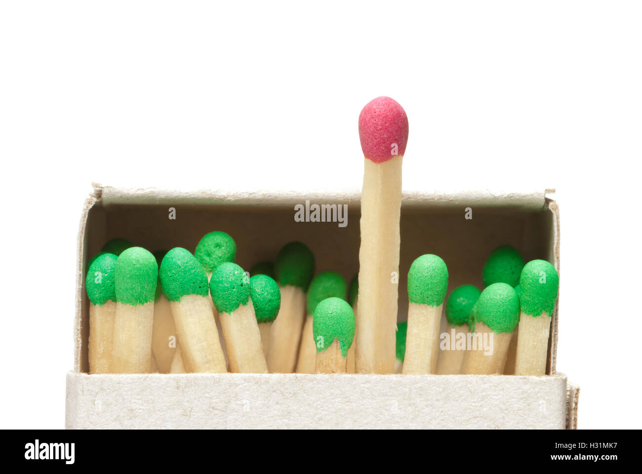 Match boxes and green matches (one match red). A white isolated