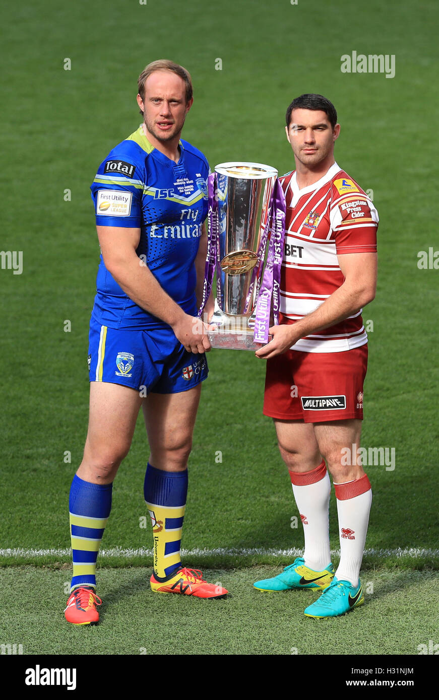 Warrington Wolves' Chris Hill (left) and Wigan Warriors' Matty Smith during a photocall at Old Trafford, Manchester. Stock Photo