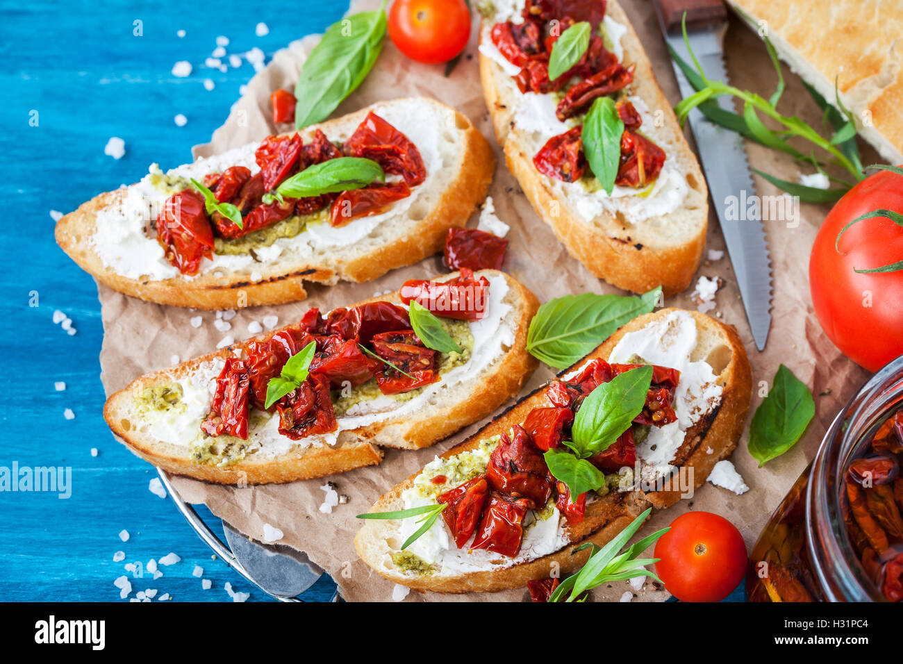 Bruschetta With Cream Cheese, Pesto, Fresh Basil And Sun Dried Tomatoes ...