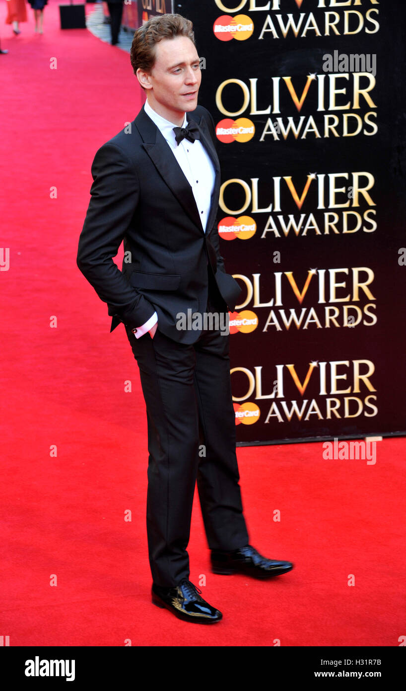Tom Hiddleston attends the Laurence Olivier Awards at The Royal Opera House on April 13, 2014 in London, England. Stock Photo