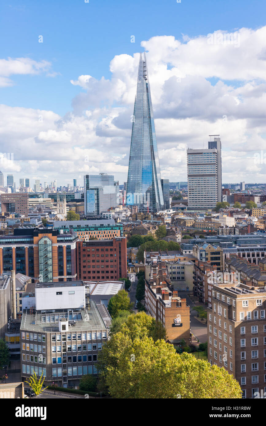 The Shard and Guy's Hospital with Canary wharf in the distance. Taken from the Tate Modern New Switch building top floor terrace Stock Photo