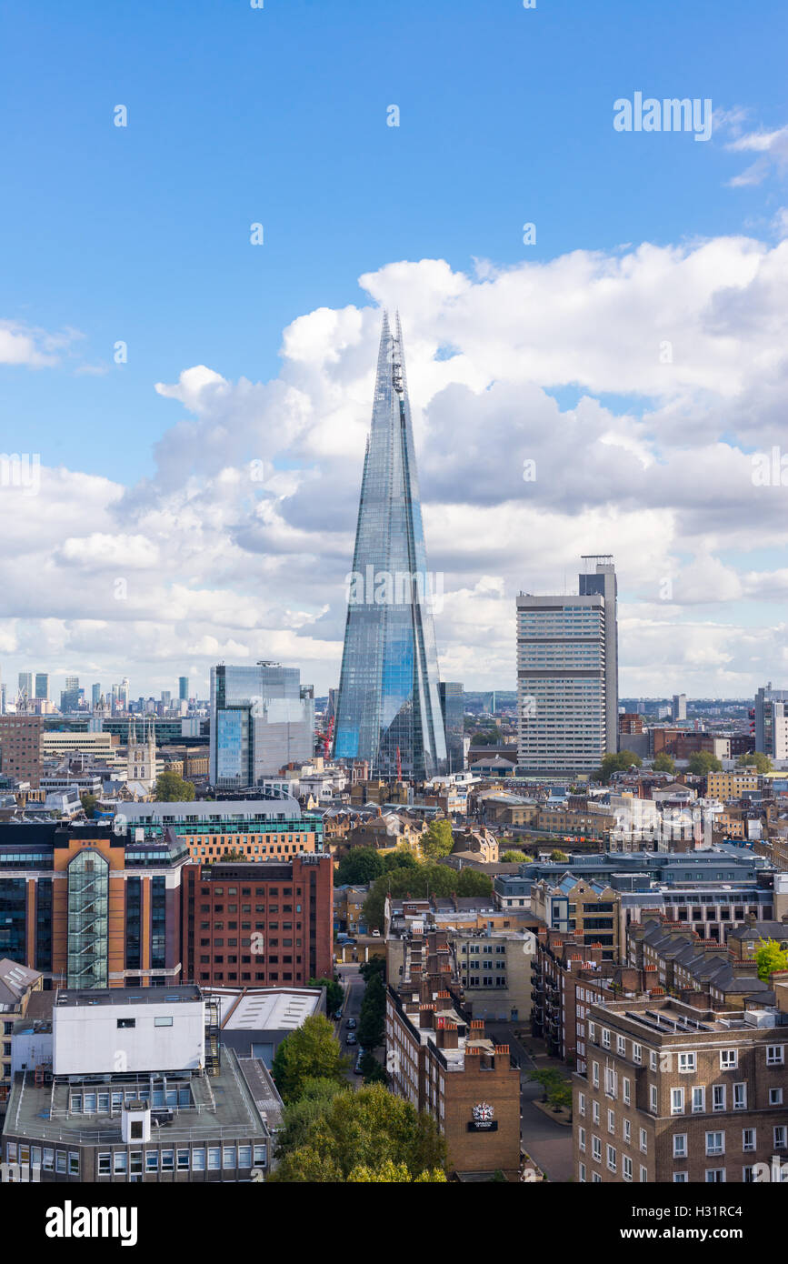 The Shard and Guy's Hospital with Canary wharf in the distance. Taken from the Tate Modern New Switch building top floor terrace Stock Photo