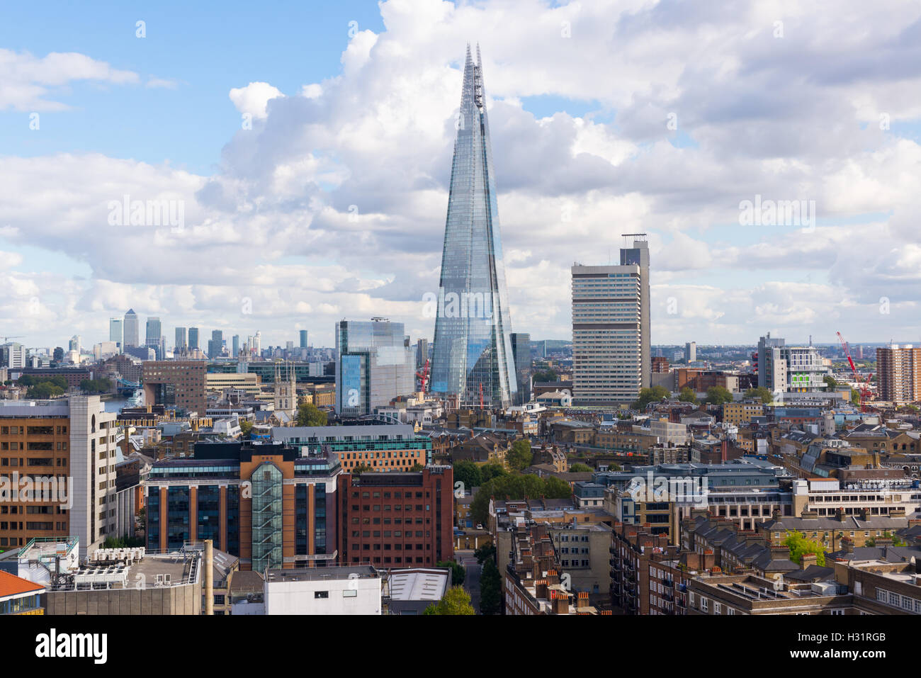 The Shard and Guy's Hospital with Canary wharf in the distance. Taken from the Tate Modern Switch House top floor terrace Stock Photo