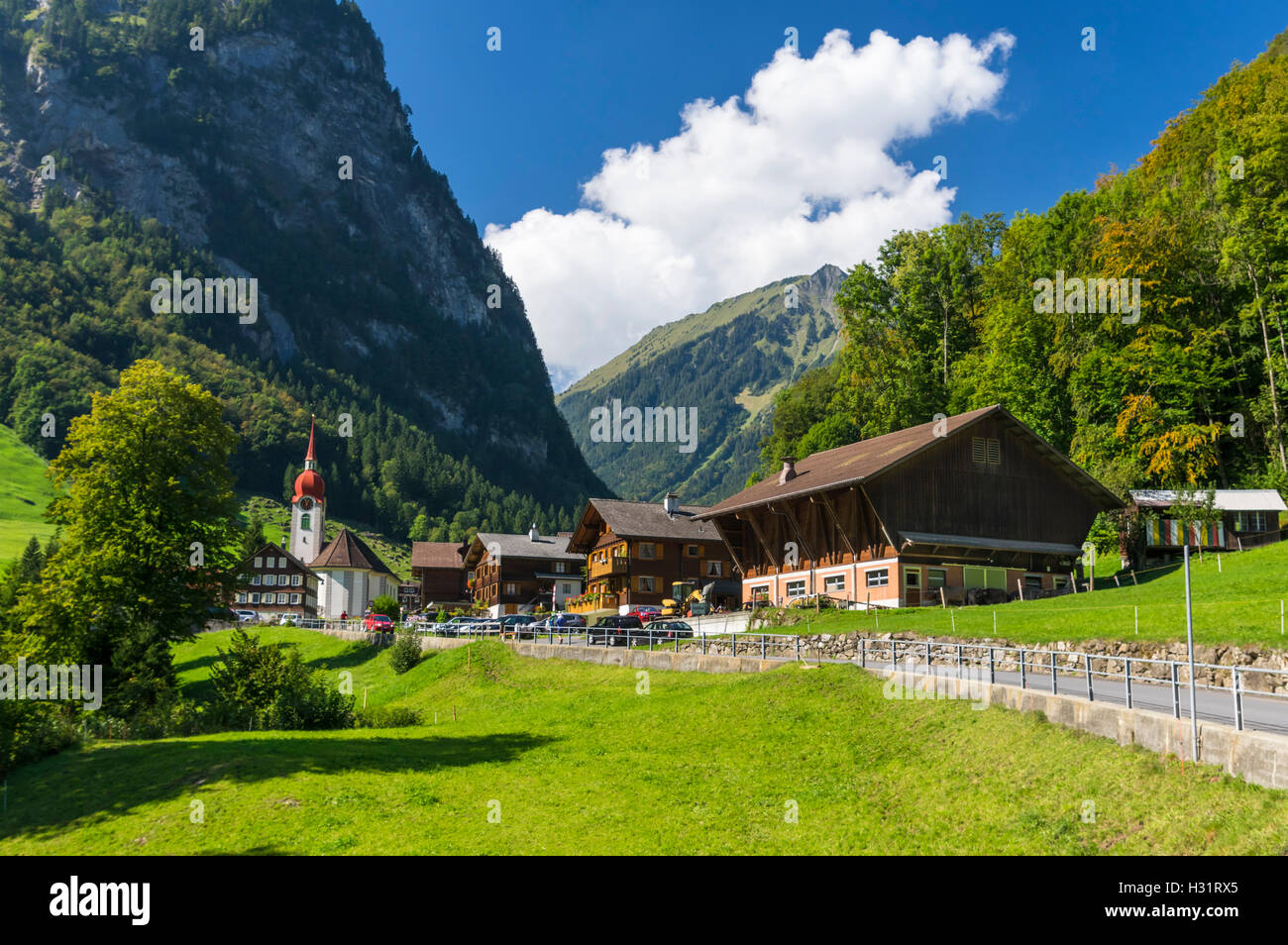 Isenthal, a small village in a valley in the Swiss Alps. Canton of Uri, Switzerland. Stock Photo