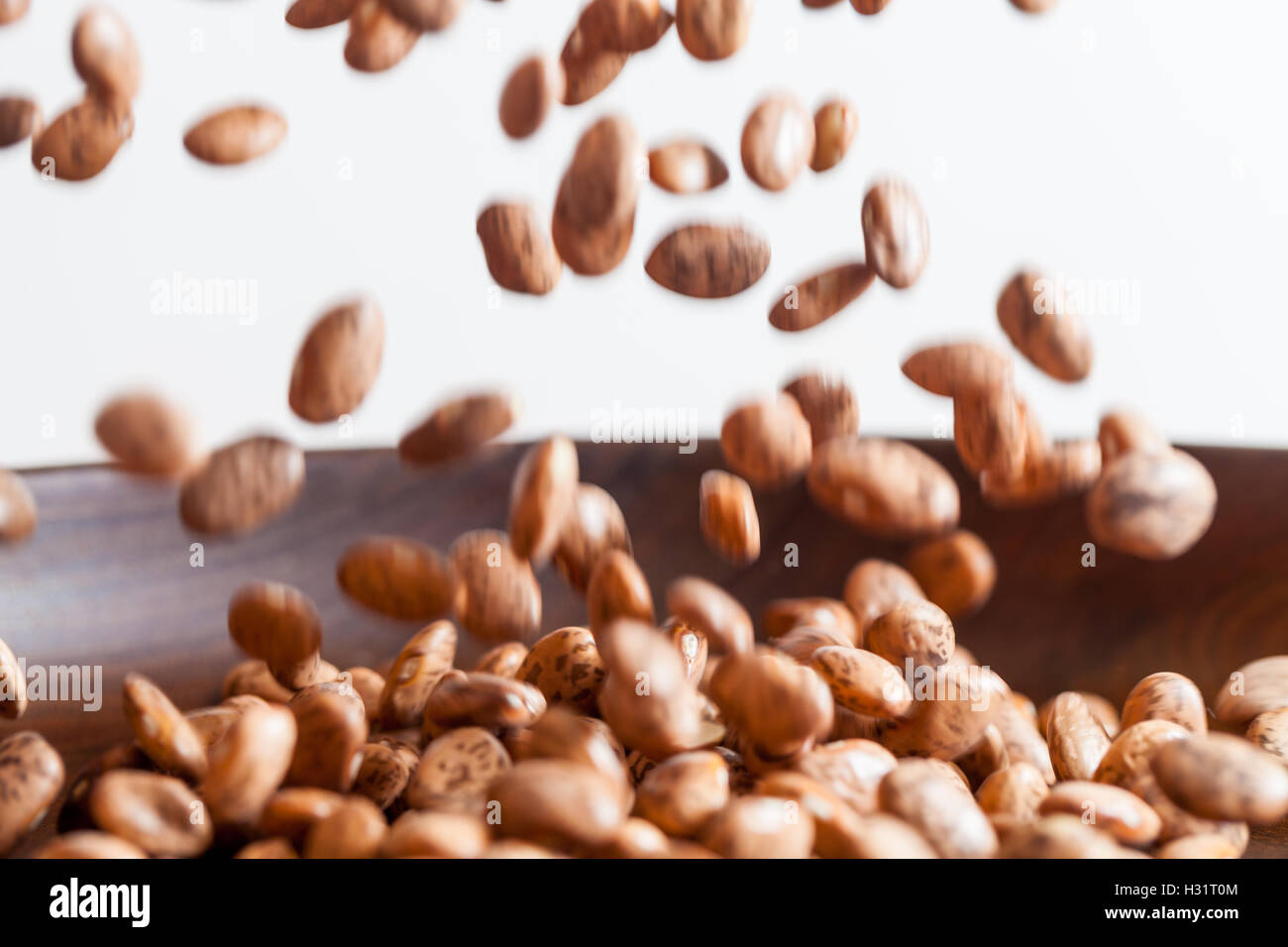 Dried Pinto Beans Falling Stock Photo Alamy