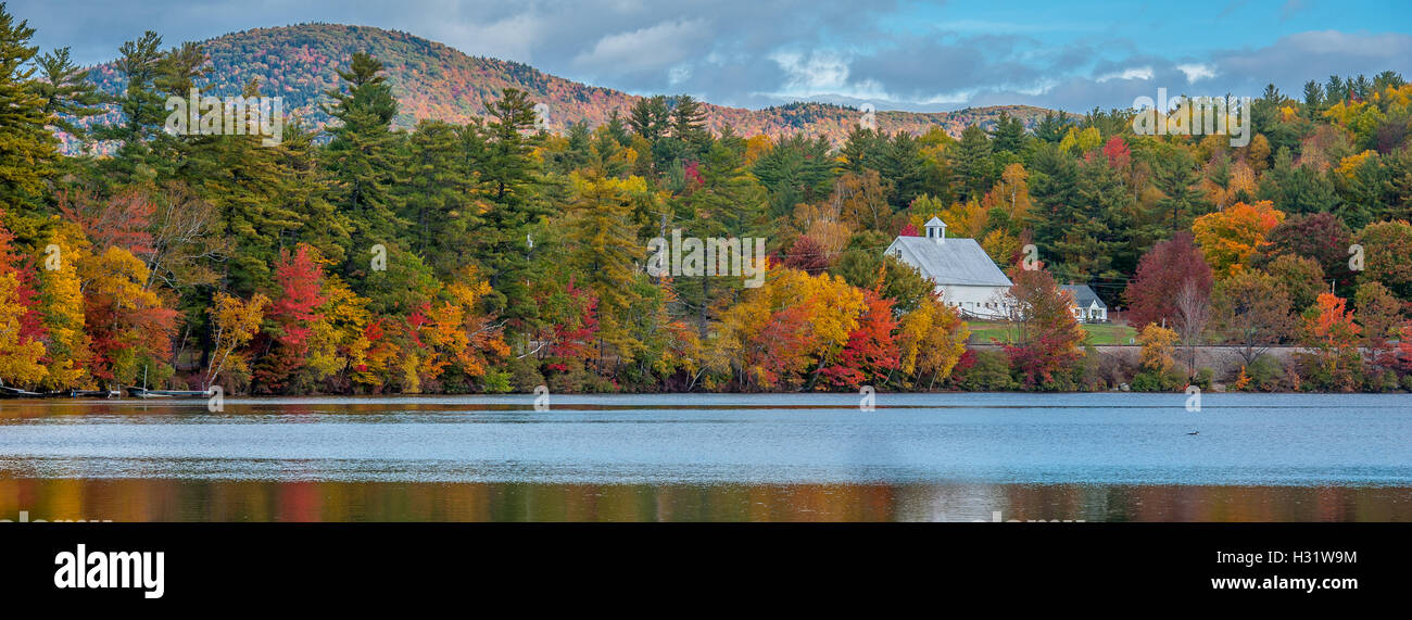 Landscape of fall foliage and mountains at Bryant Pond in Maine Stock