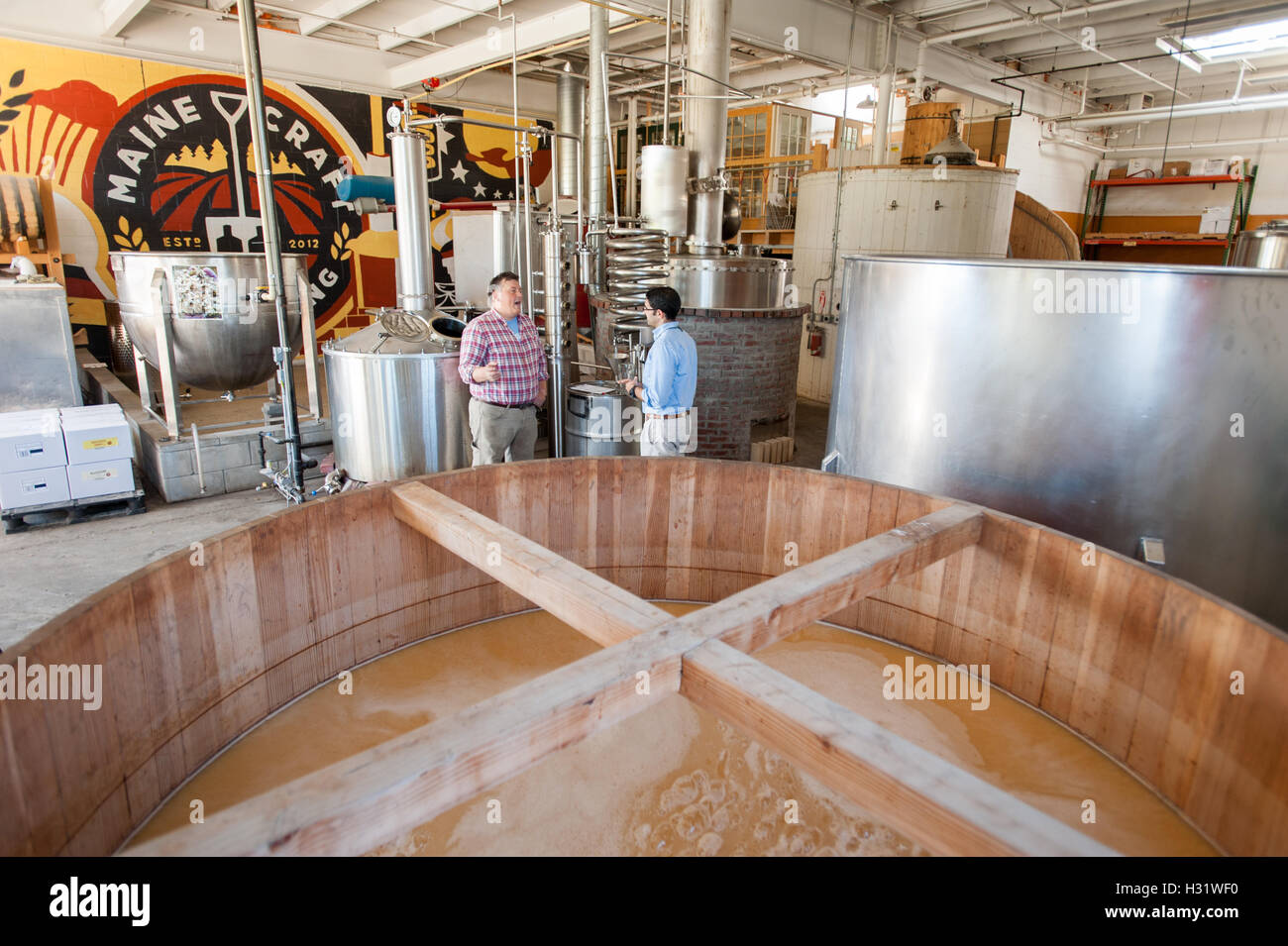 Wooden fermentation tank at a distillery in Portland, Maine. Stock Photo