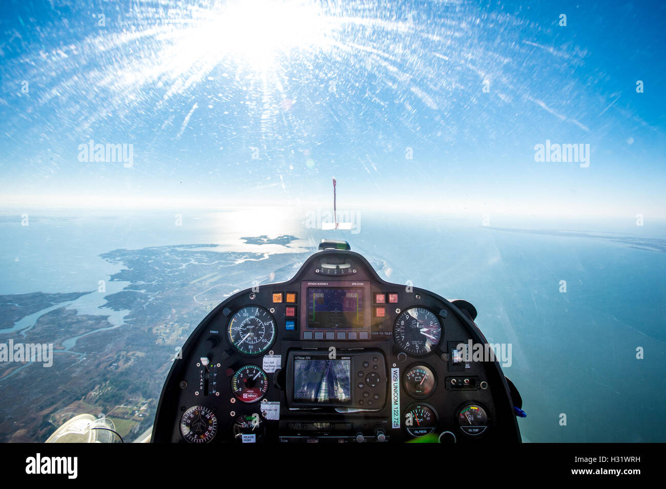 Interior view of the cockpit of an airplane flying over Tangier Island in Virginia. Stock Photo