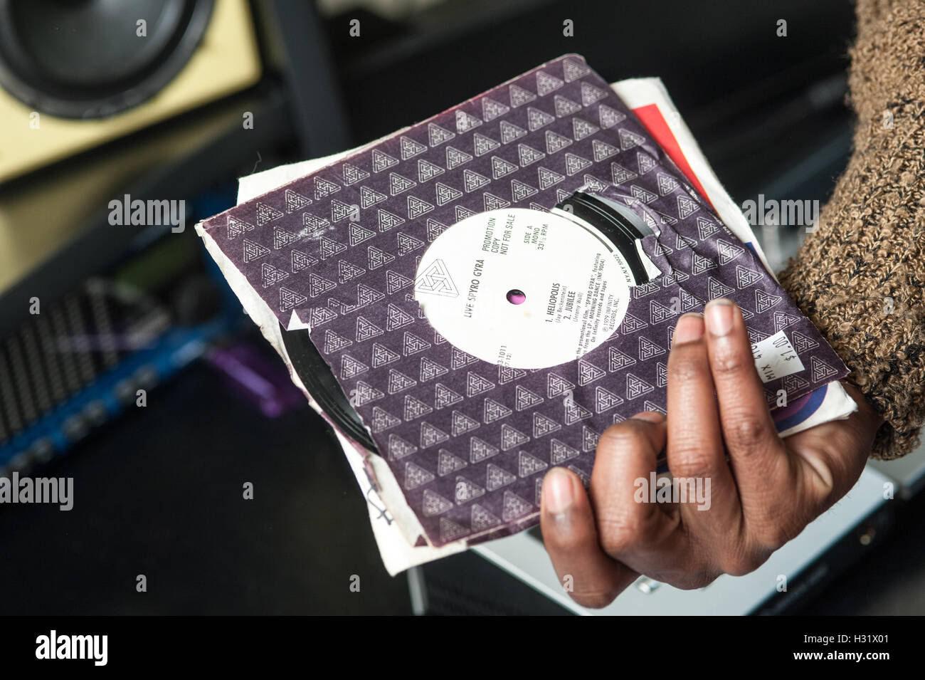 Hand holding records Stock Photo Alamy