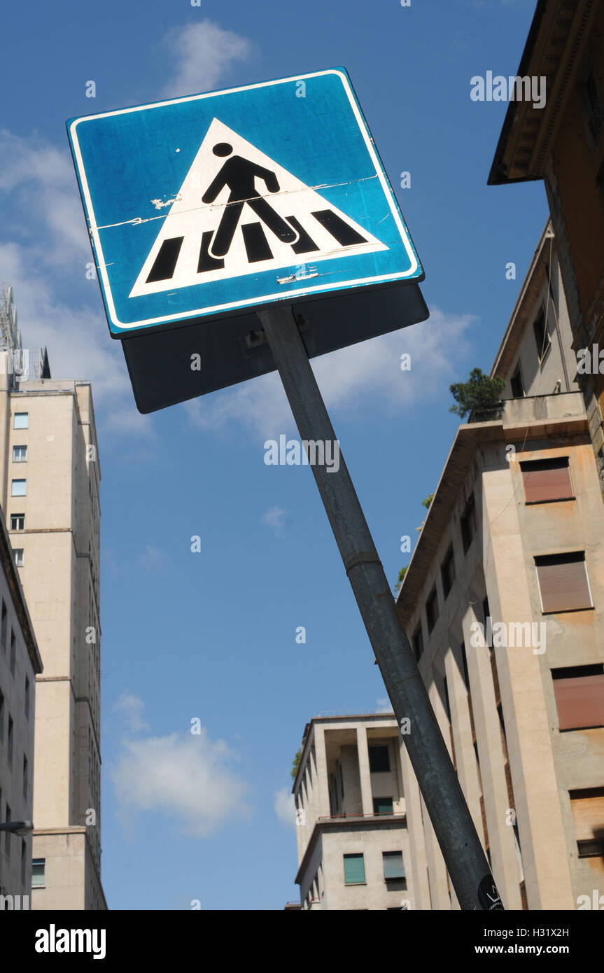 This image shows a pedestrian closing road from a low angle view. Stock Photo