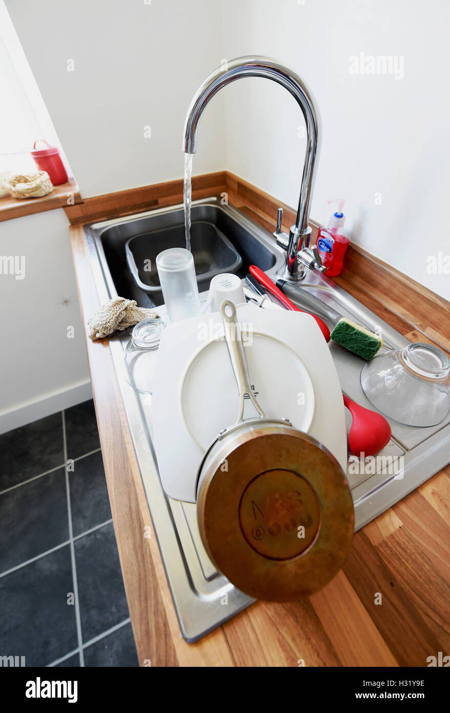 Clean kitchen utensils in sink hires stock photography and images Alamy