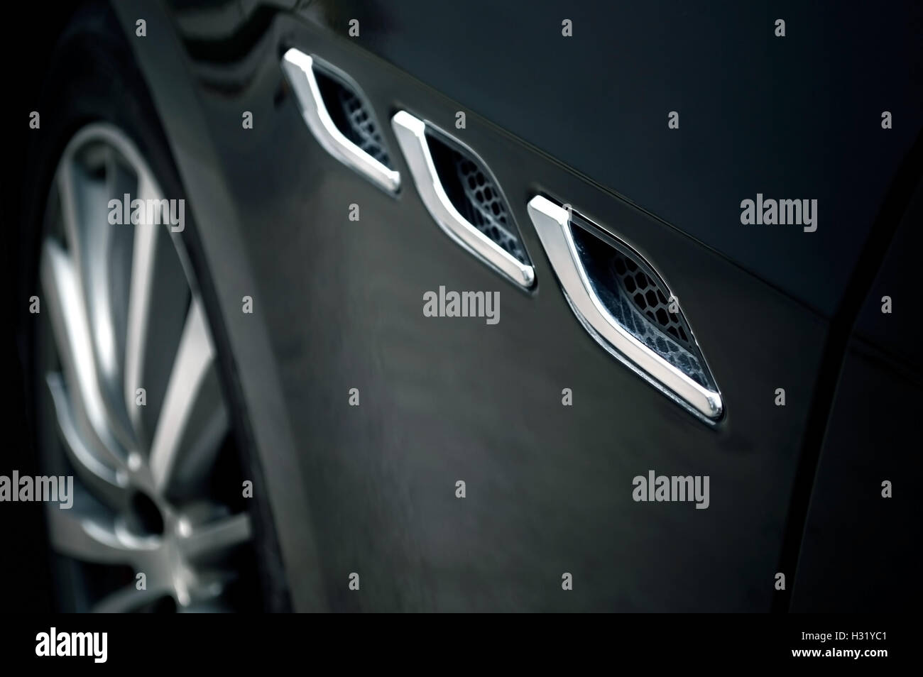 Close-up of sport car details. Concept of automotive wallpaper Stock Photo