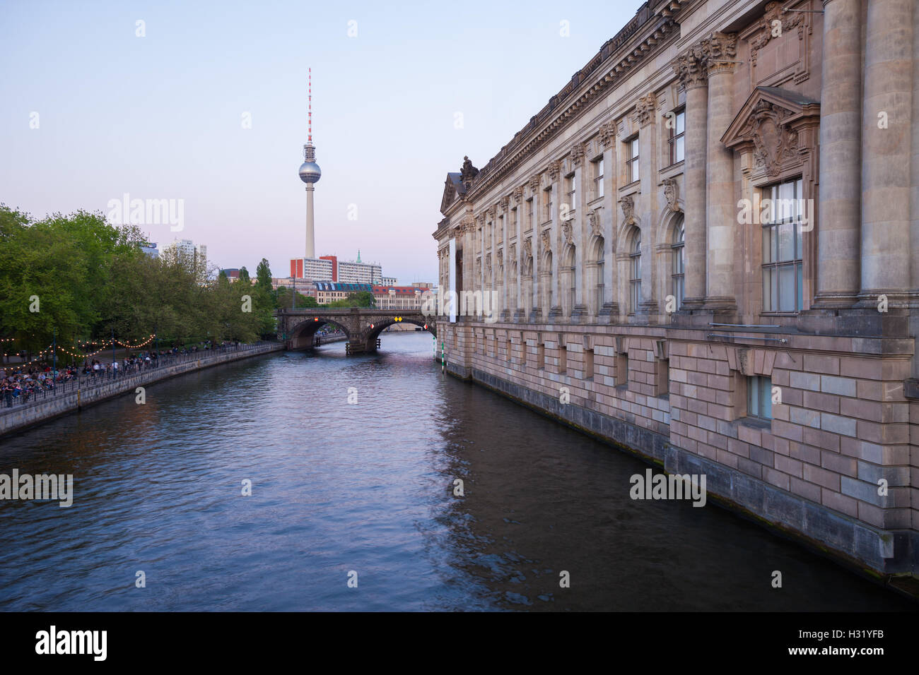 Berlin's River Spree, TV Tower, and side of the Bode Museum at dusk Stock Photo